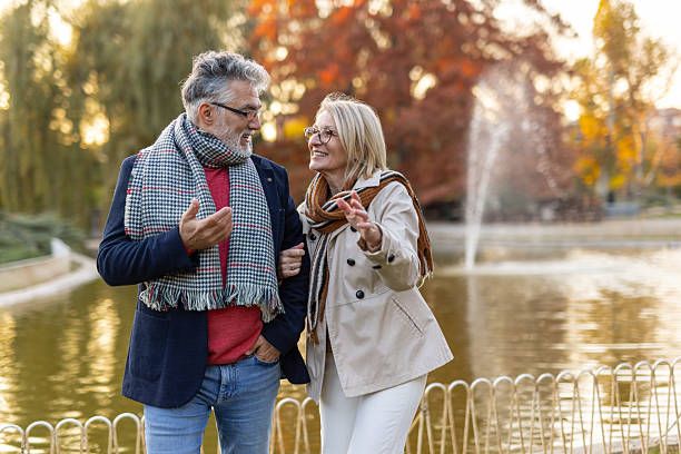 istock Couple Learning Together With Joyful Expressions in Nature 2219100172