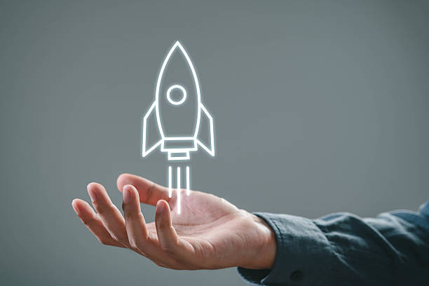 istock A hand holding a rocket illustration symbolizes innovation, growth, and ambitious dreams in a creative business context. 2219101467