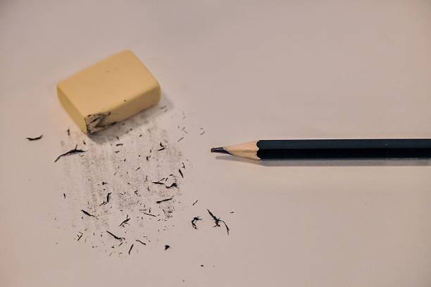 istock Sketchbook with Erased Pencil Marks and Eraser Artistic Process Concept 2219104603