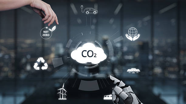 istock Hand Reaching for Cloud Symbolizing Carbon Dioxide with Eco-Friendly Icons in Modern Office Setting Emphasizing Sustainability and Environmental Responsibility. Auvana 2219105698