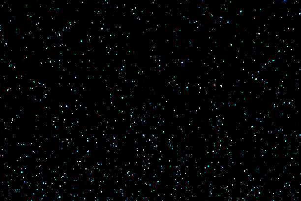 Stars in the night. Galaxy space background. Dark blue starry night sky. Stars falling in the loop.
