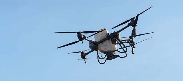 istock Drones flying in the sky, Drones for agriculture 2219120686