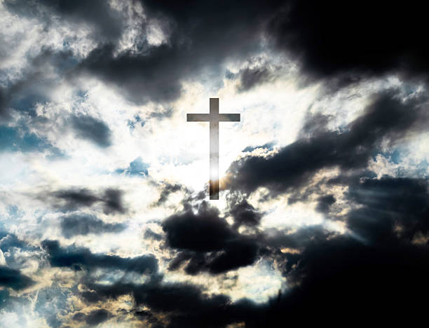 Cross christian god religion on dark sky