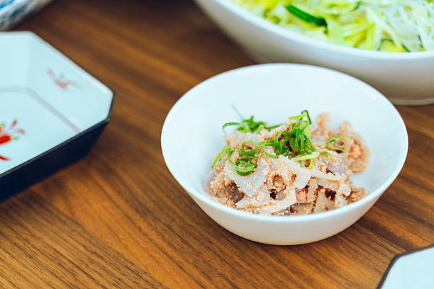Japanese side dish of lotus root and seasoned cod roe (tarako)