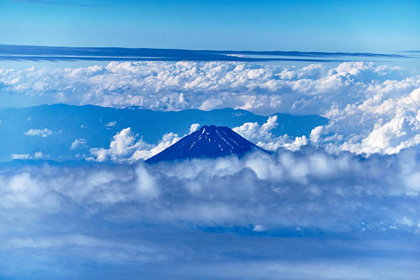Ağrı and Iğdır provinces, Turkey: snowcapped Mount Ararat (aka Mount Ağrı / Masis) at dawn, seen from the air with the 5,137 m (16,854 ft) peak above the clouds. Great Ararat, Turkey's highest point. Located near the Turkish border with Iran, Armenia, and Azerbaijan (Nakhchivan).