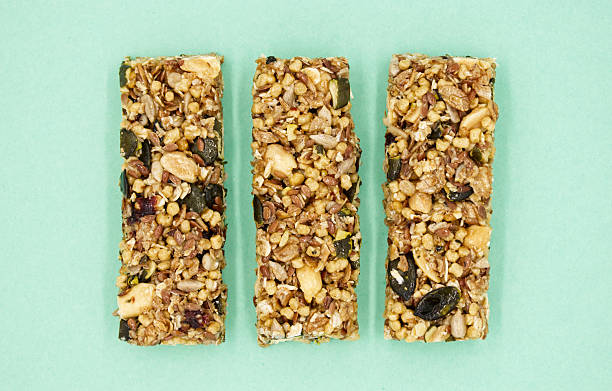 istock Healthy Granola Bars on Mint Green Background 2219126533