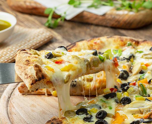 istock Italian pizza with mozzarella cheese close-up pizza slice 2 2219129507
