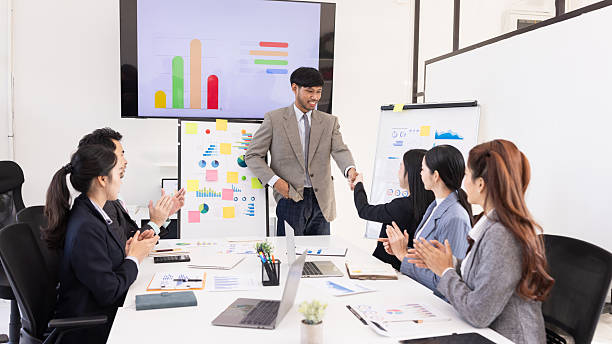 istock Group of business people handshake and working together with dashboard analysis and data management in meeting room. 2219132447