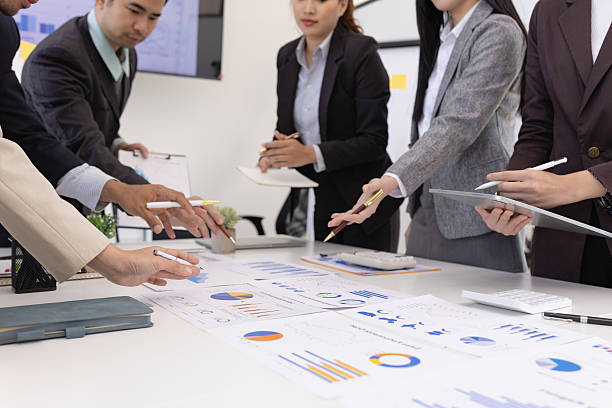 istock Group of businesspeople working plan analysis project brainstorm in modern office 2219134527
