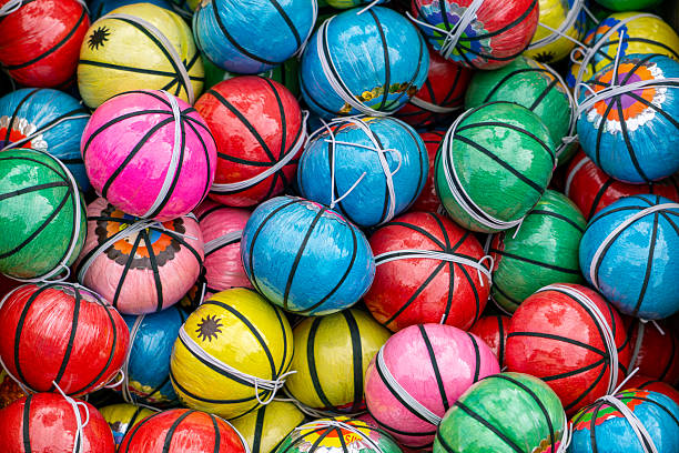 istock Colorful plastic bounce balls with elastic bands forming a vibrant background. 2219135574