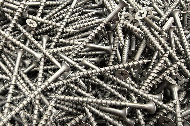 istock Scattered metal screws reflect construction and organization needs 2219136361