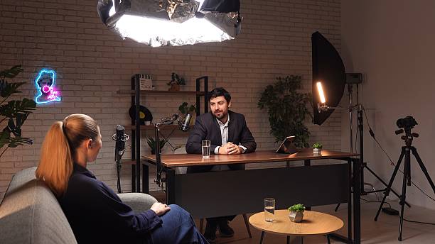 istock A backstage scene from the podcast. Engaging Podcast Interview Unfolds in Modern Studio Setting With Creative Storytelling 2219138765