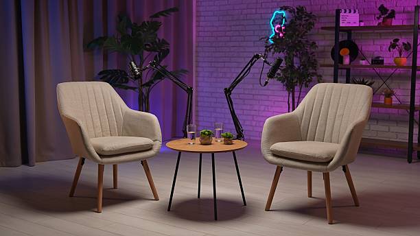 istock Inspiring Conversation Unfolds in a Modern Podcast Studio With a Cozy Setup 2219140165