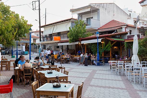 istock A charming outdoor cafe scene with tables and chairs 2219142018