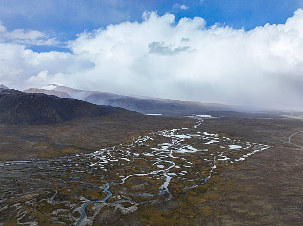 istock Aerial view of a wide river delta flowing through a valley 2219142168
