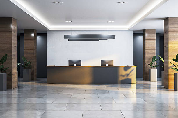 istock Modern empty hotel reception area with clean desk and luxury interior design, front view with blank wall for branding or signage mockup. 3D Rendering 2219143260