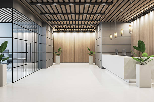 istock Modern luxury office reception interior with wooden paneling, glass partitions, ceiling lights, and minimalistic furniture design. 3D Rendering 2219143264