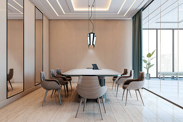 istock Modern executive boardroom interior with luxury furniture, backlit ceiling, and clean design overlooking cityscape through glass walls. 3D Rendering 2219143396