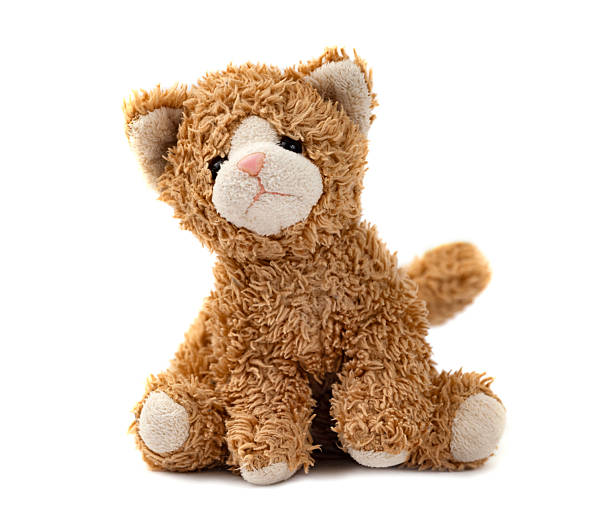 istock Fluffy toy cat isolated on white.Vintage kitten. 2219143532