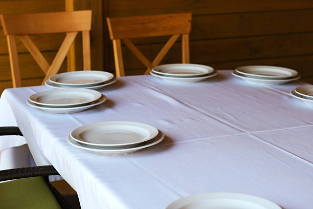 istock Gathering around a neatly set table for a joyful meal 2219144138