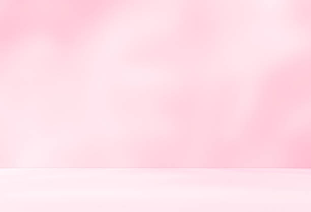 istock Empty pink colour room studio with sunlight effect shadow on the floor and wall for product presentation. 2219146004