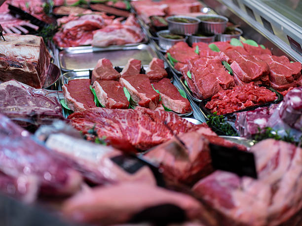 istock Fresh meat display case at butcher shop counter 2219146635