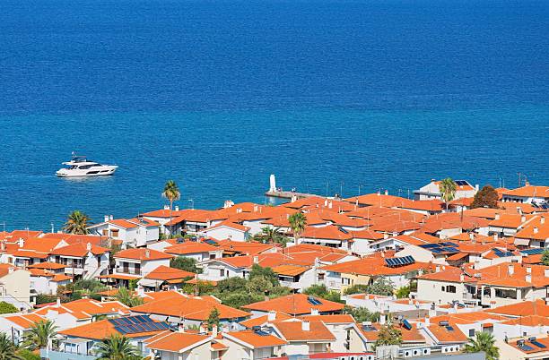 istock A coastal town with orange rooftops meets the vast blue sea 2219149708