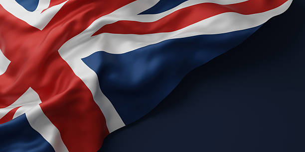 istock United kingdom or england flag on dark blue background with copy space 3D render 2219150490