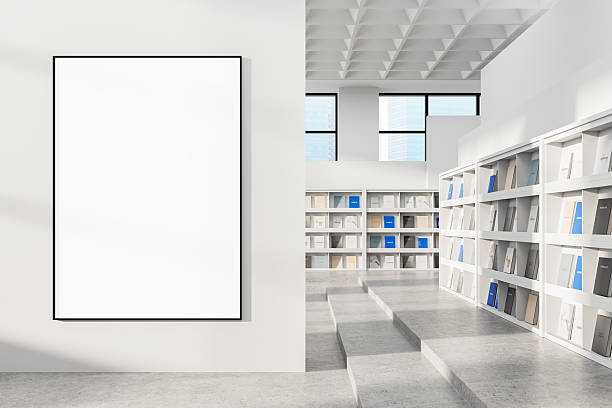 istock Blank vertical poster mockup in modern white interior with bookshelves and large windows, clean design template for advertising or artwork display. 3D Rendering 2219153030