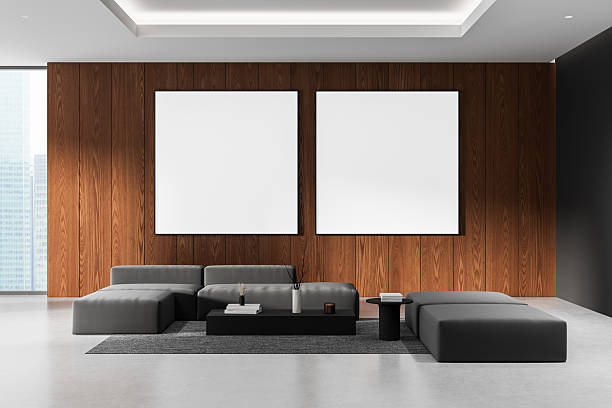 istock Modern interior design with two blank poster mockups on wooden wall above minimalist grey sofa in clean, bright living room layout. 3D Rendering 2219153569