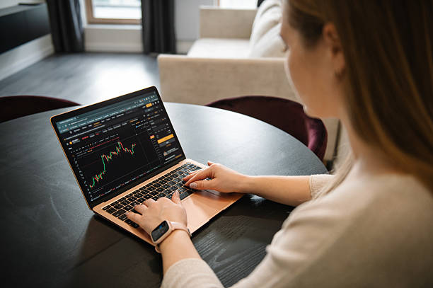 istock Cryptocurrency market growth chart. Work on laptop monitor screen closeup. Selling ether, bitcoin or altcoin. Financial stock analysis, trading market research, buying, selling, risk, profit analysis. 2219154814