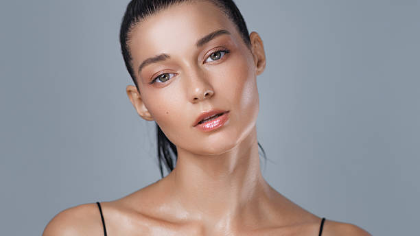 istock Tired Woman with Wet Skin After Workout Looking at Camera in Studio 2219155606
