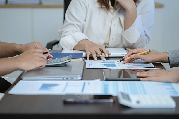 istock Businessmen team or financial data analysts working with tablets and laptop computers and data graphs together. Plan to analyzing projects in the office 2219156961