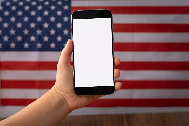istock Mobile black phone with a white blank screen for text or product 2219157550