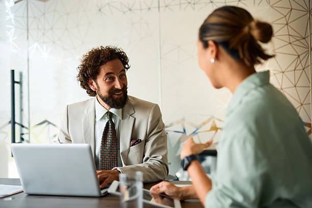 istock Business partners discussing a project using a laptop in the office 2219159029