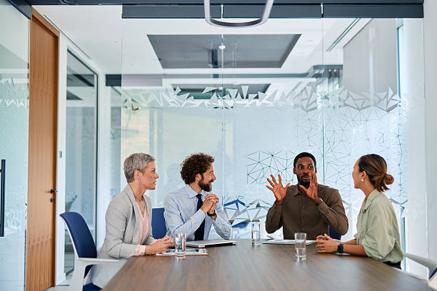 istock Business team discussing during a meeting in a modern office 2219159154