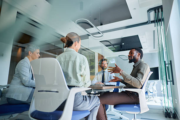 istock Diverse business team discussing during a meeting in a modern office 2219159392
