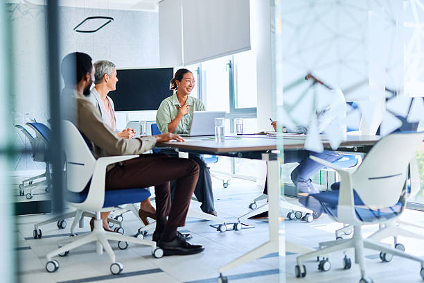 istock Business team meeting brainstorming exchanging ideas in modern office 2219159654