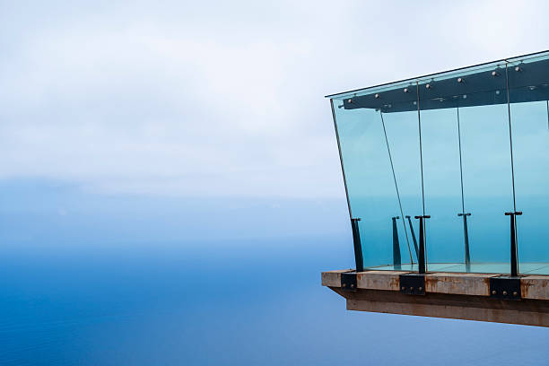istock A glass structure with a view of the ocean. 2219162069