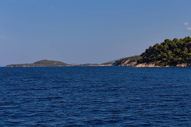 istock serene seascape with deep blue water and a distant coastline 2219163428