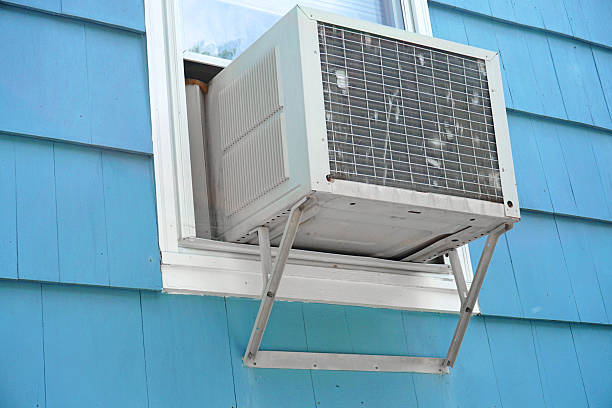 istock old air conditioner installed on house window 2219164064