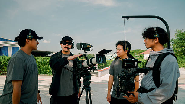 istock Asian camera crew discussing camera movements and angles for the junior skateboard competition. 2219166394