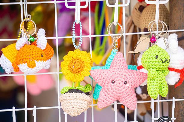 istock Keychain crafts made from knitting yarn hanging on display 2219167091