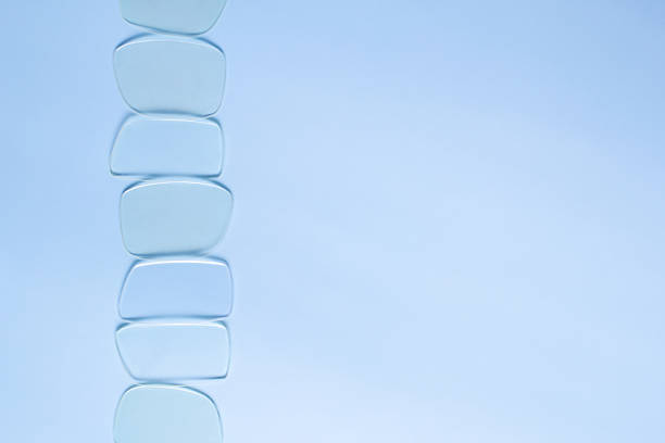 Contact lenses in minimalist style in blue tones for vision correction with copy space
