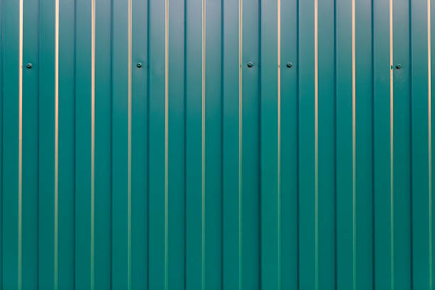 Green metal sheet in industrial style in teal tones for construction and design