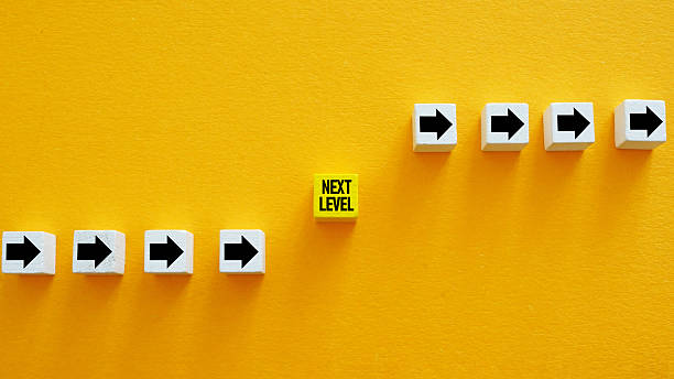 istock Rising arrows and the phrase next level. Personal achievement. 2219167409