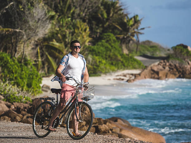 istock Handsome man with vintage bicycle. Clear, sunny day 2219167434