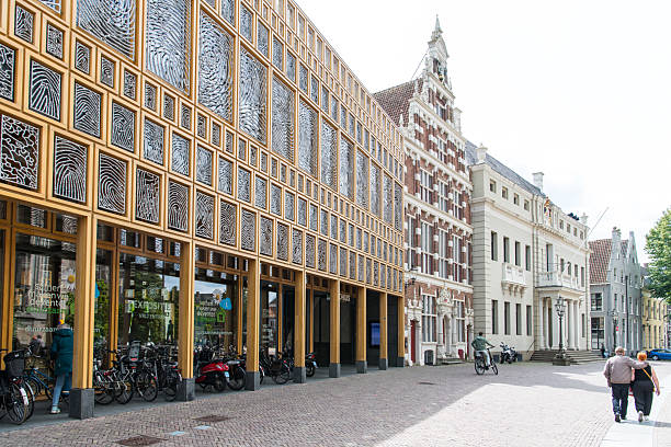 Netherlands, Amsterdam - April 08, 2024: Albert Heijn supermarket entrance building on the Museumsplein