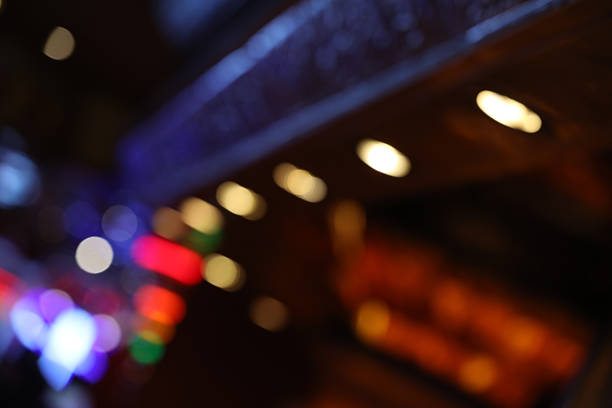 istock Blurred lights at twilights, city and office building, abstract background 2219169104