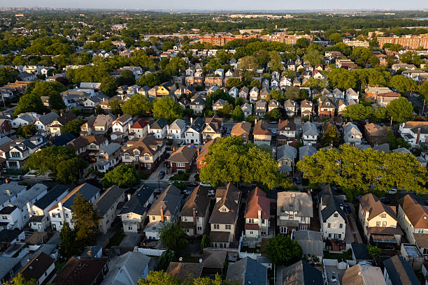 Suburban homes arranged neatly on tree-lined streets